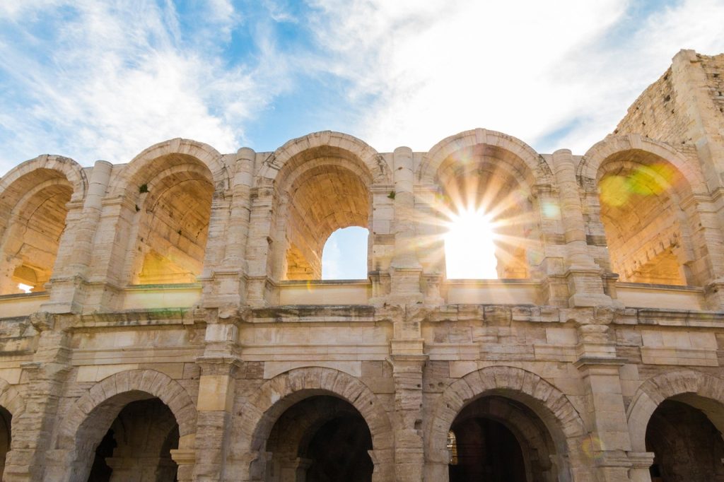 the amphitheatre of arles, colosseum, arles, camargue, backlighting, sun star, summer, attraction, sightseeing, france, south france, nature, evening light, sunset, dazzling star, theatre